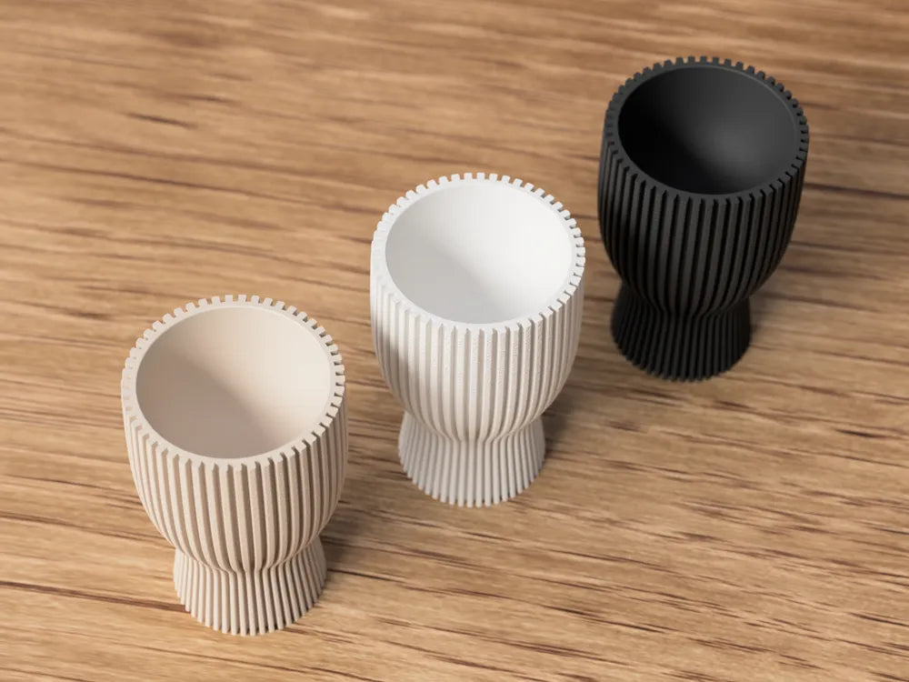 Nord Æggebæger fra NorthLayer, keramisk æggebæger med minimalistisk design og blød blå farve.