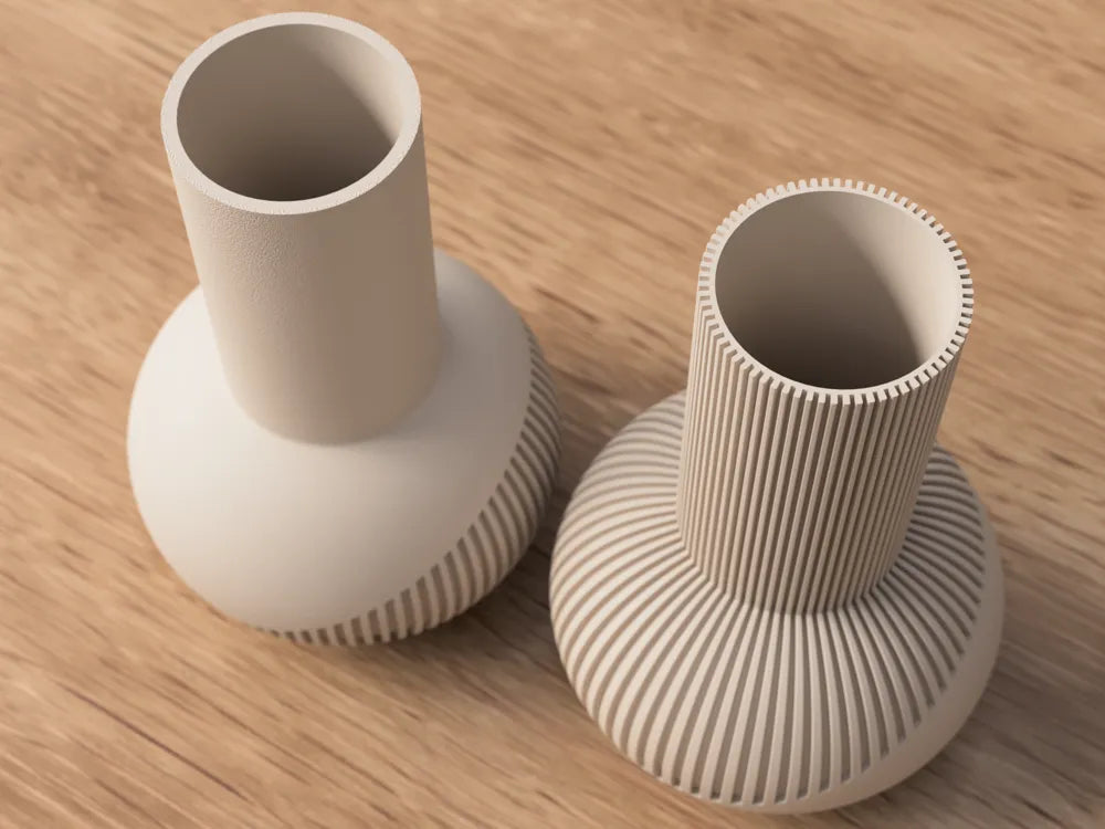 Moderne nordisk Aura vase af NorthLayer med glat, rund form og minimalistisk design på en hvid baggrund.